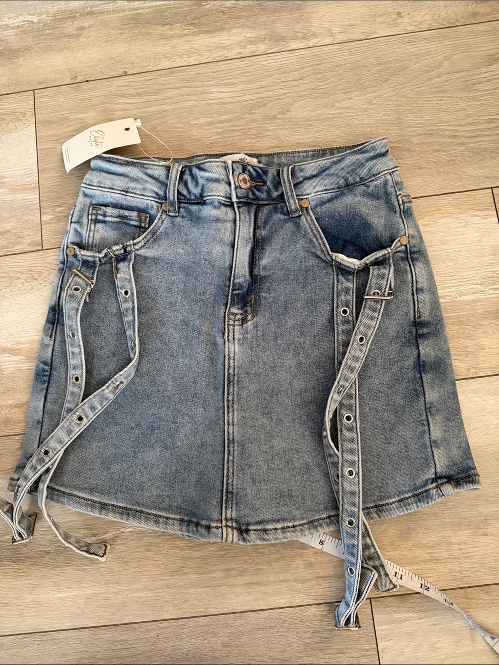 Nina Rossi Washed Blue Denim Mini Skort  with Grommet Strap Detail